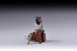 TG HF001 - Lady Sitting on Suitcase